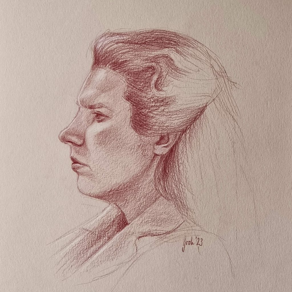 Seitenprofil einer Frau mit rotem Buntstift