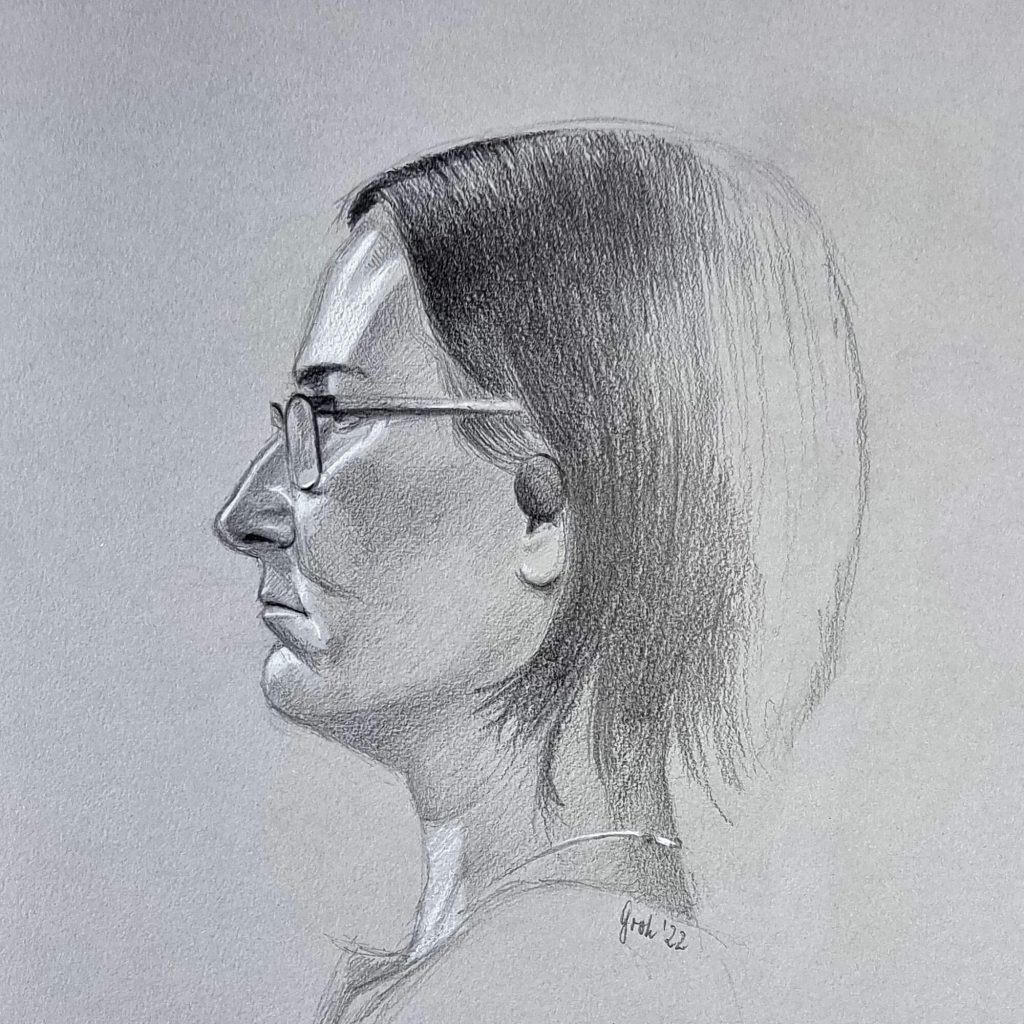 Seitenansicht einer Frau mit Brille