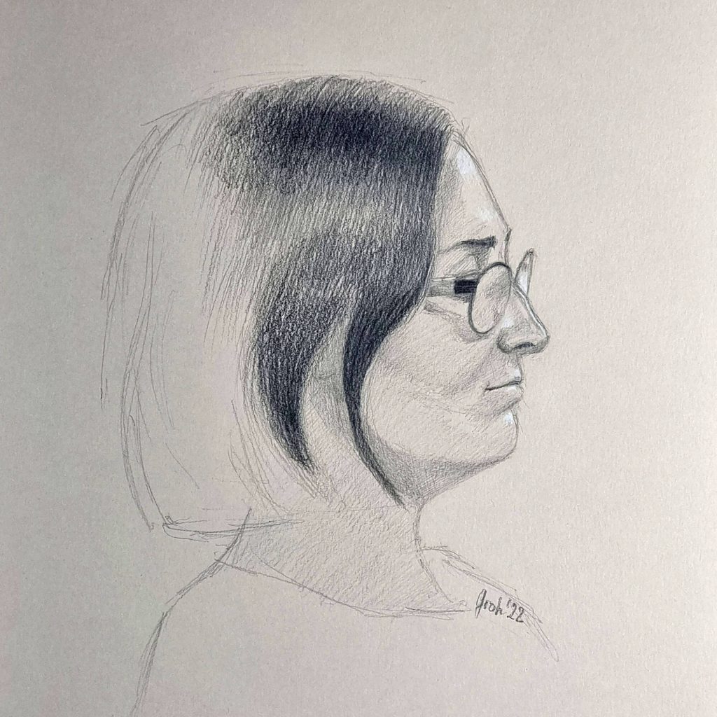 Weibliches Profil mit Brille